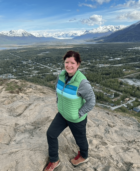healthcare provider on top of a mountain on the outskirts of a small Alaskan village